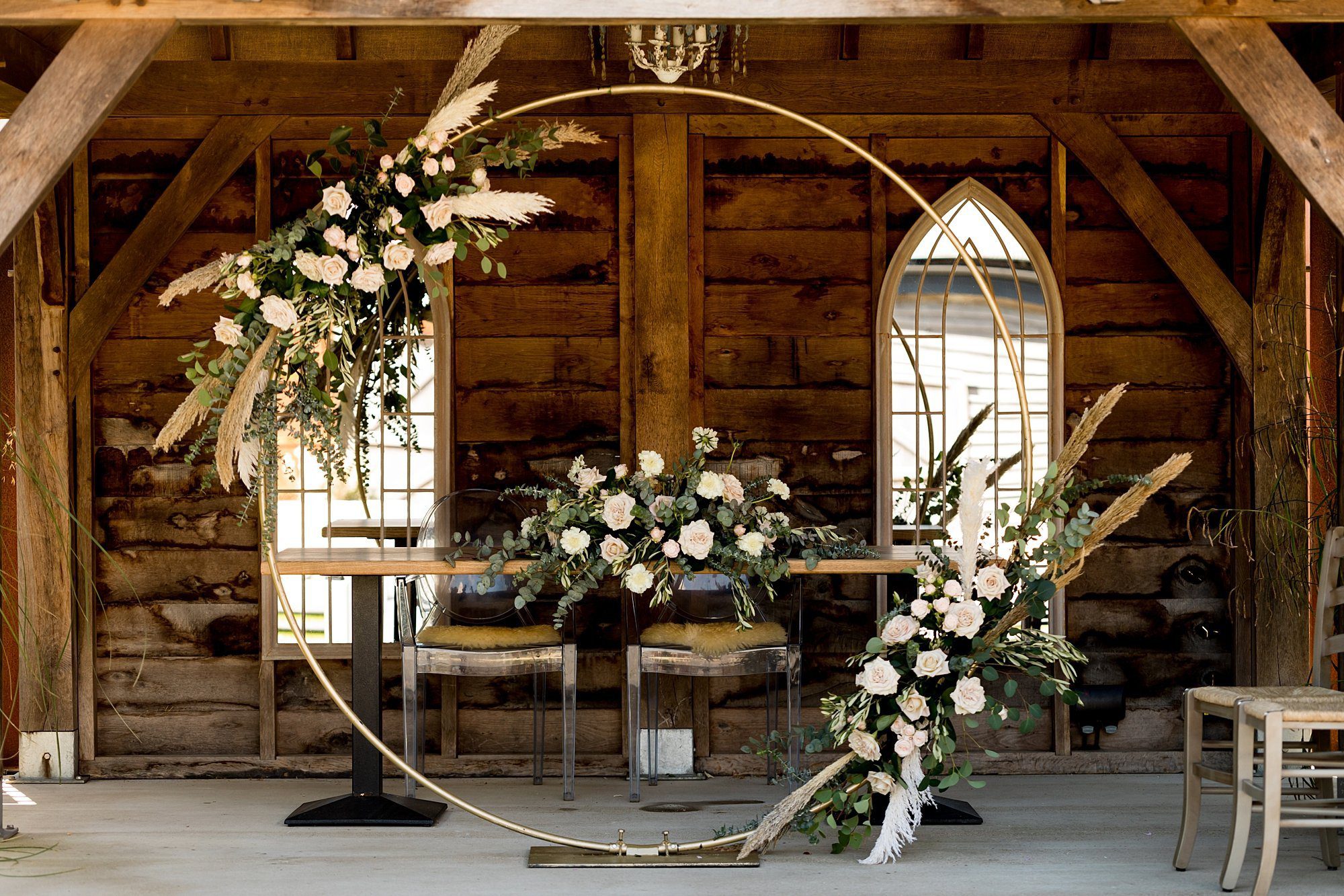 chic styled wedding southend barns pastel rose pampas grass circular wedding arch