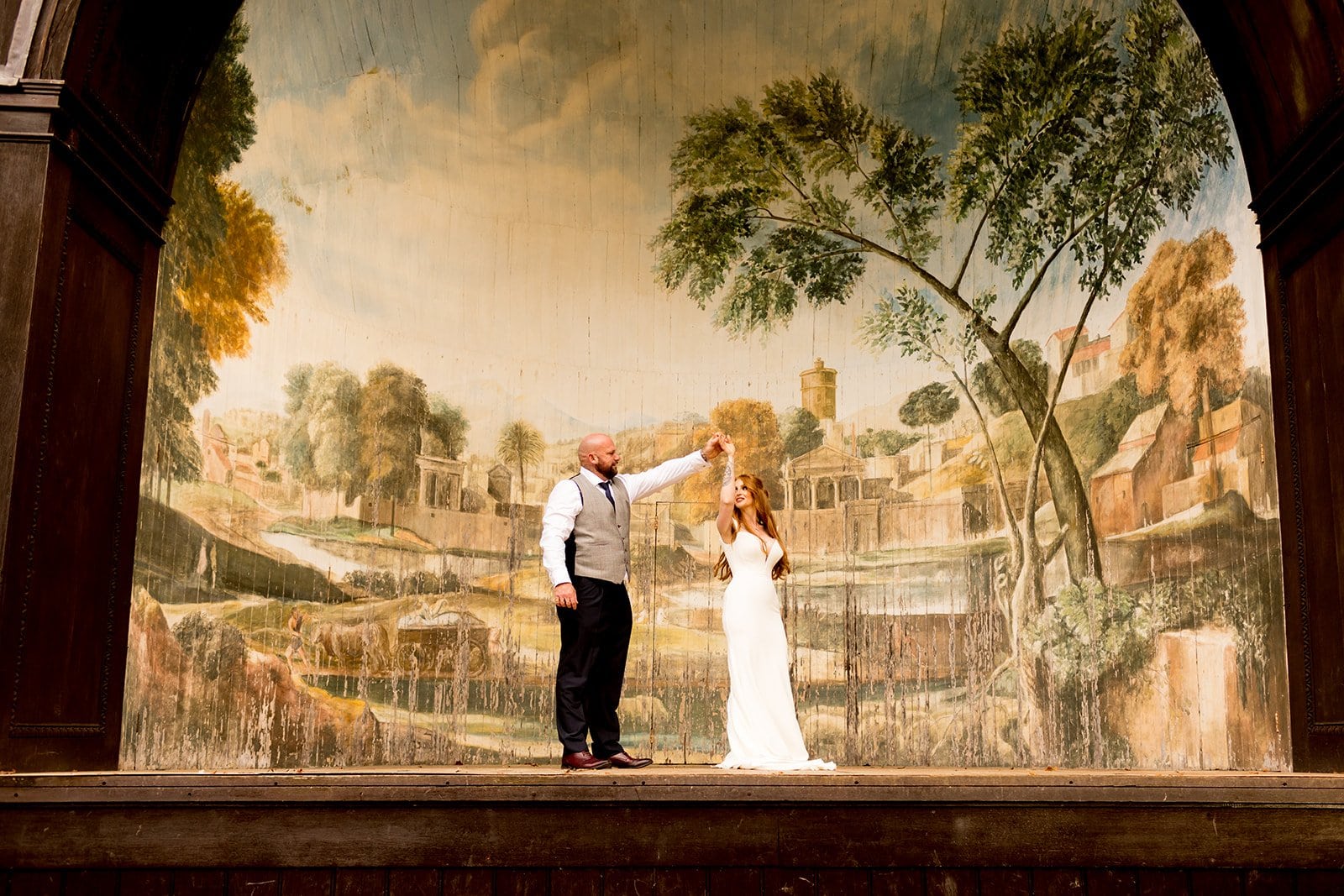 Painted backdrop to couple wedding portraits 