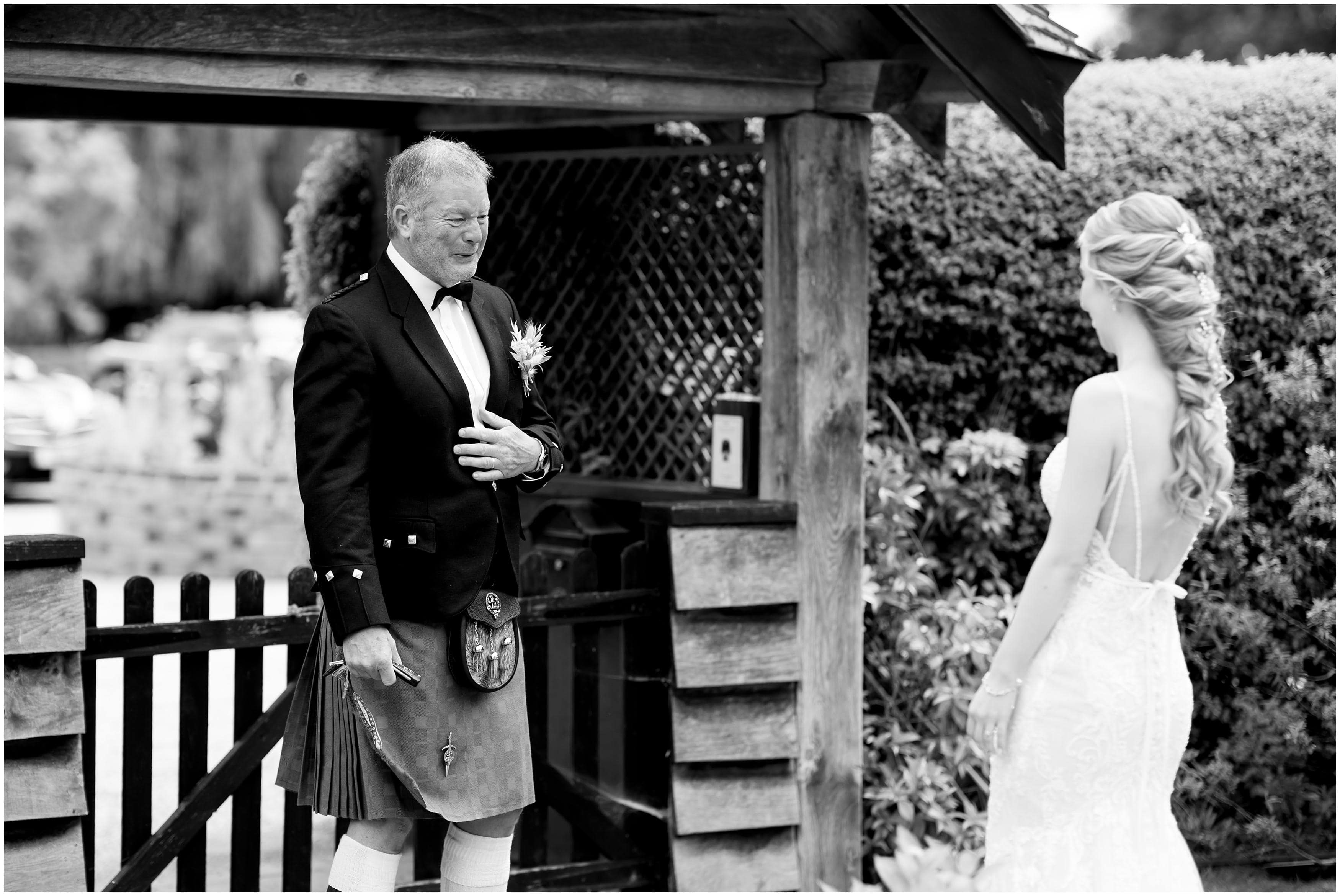 Father of the bride first look on wedding day at Bradgate Manor