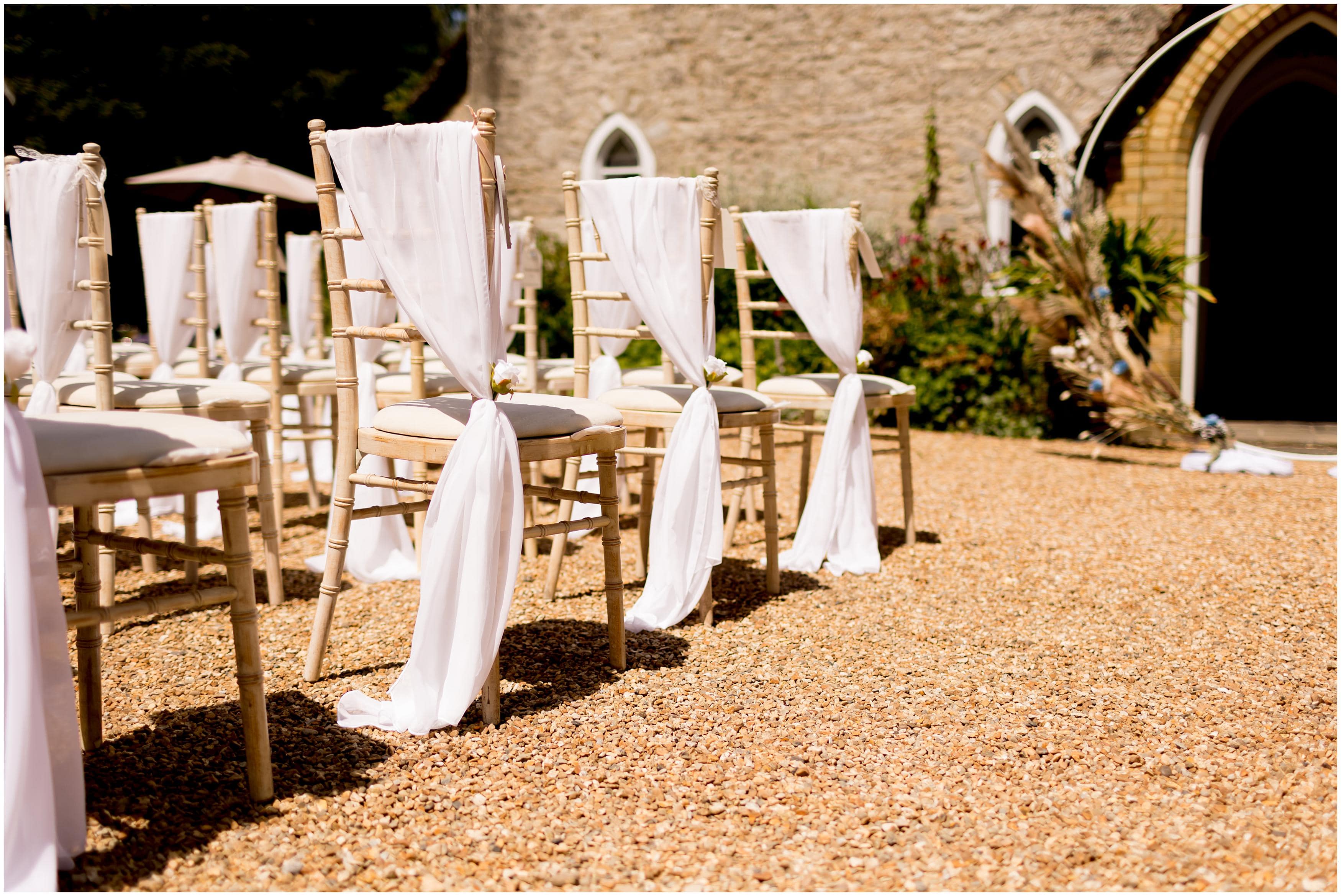 Elegant white outdoor ceremony decor