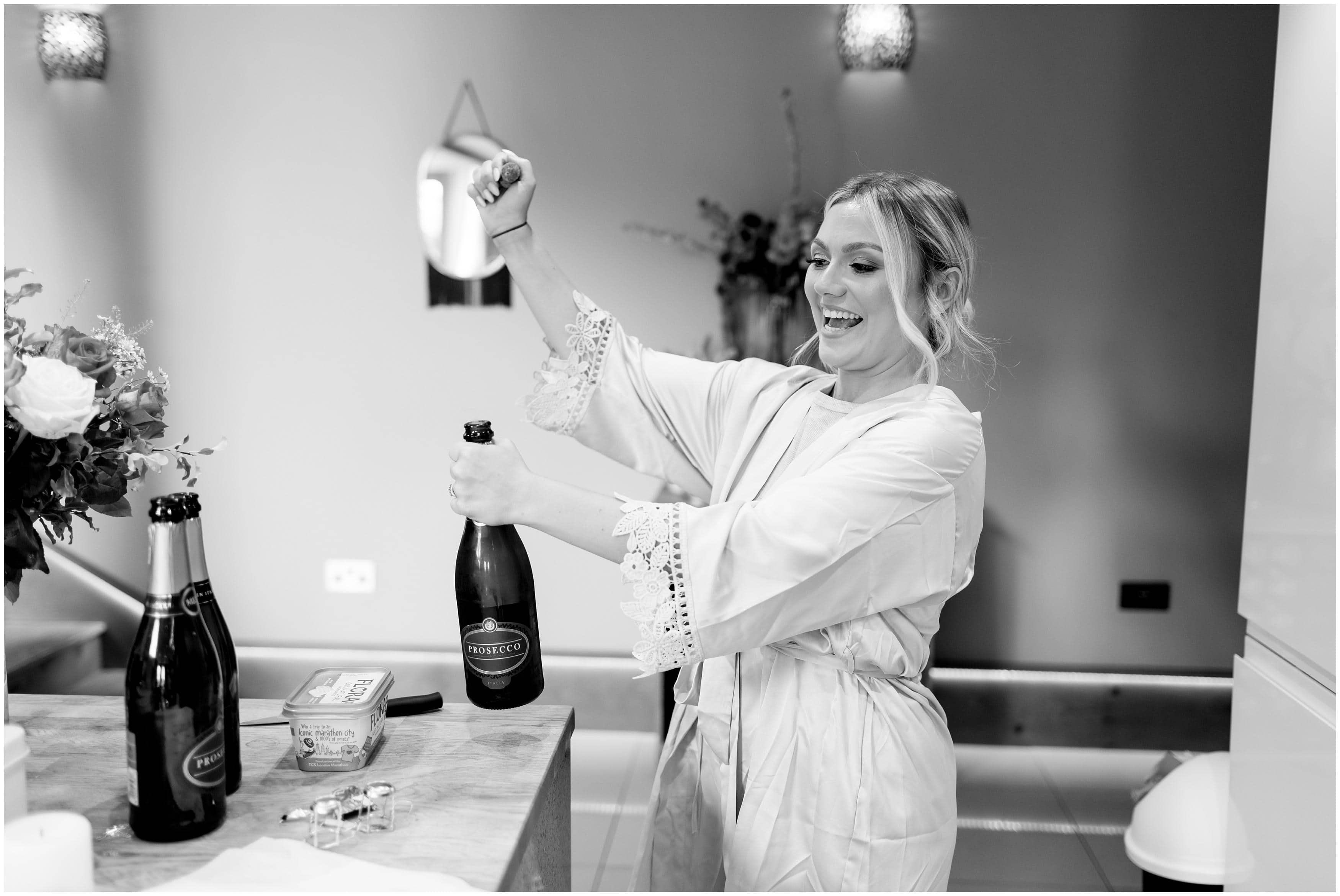 Campagne toast with bridesmaids at Bradgate Manor