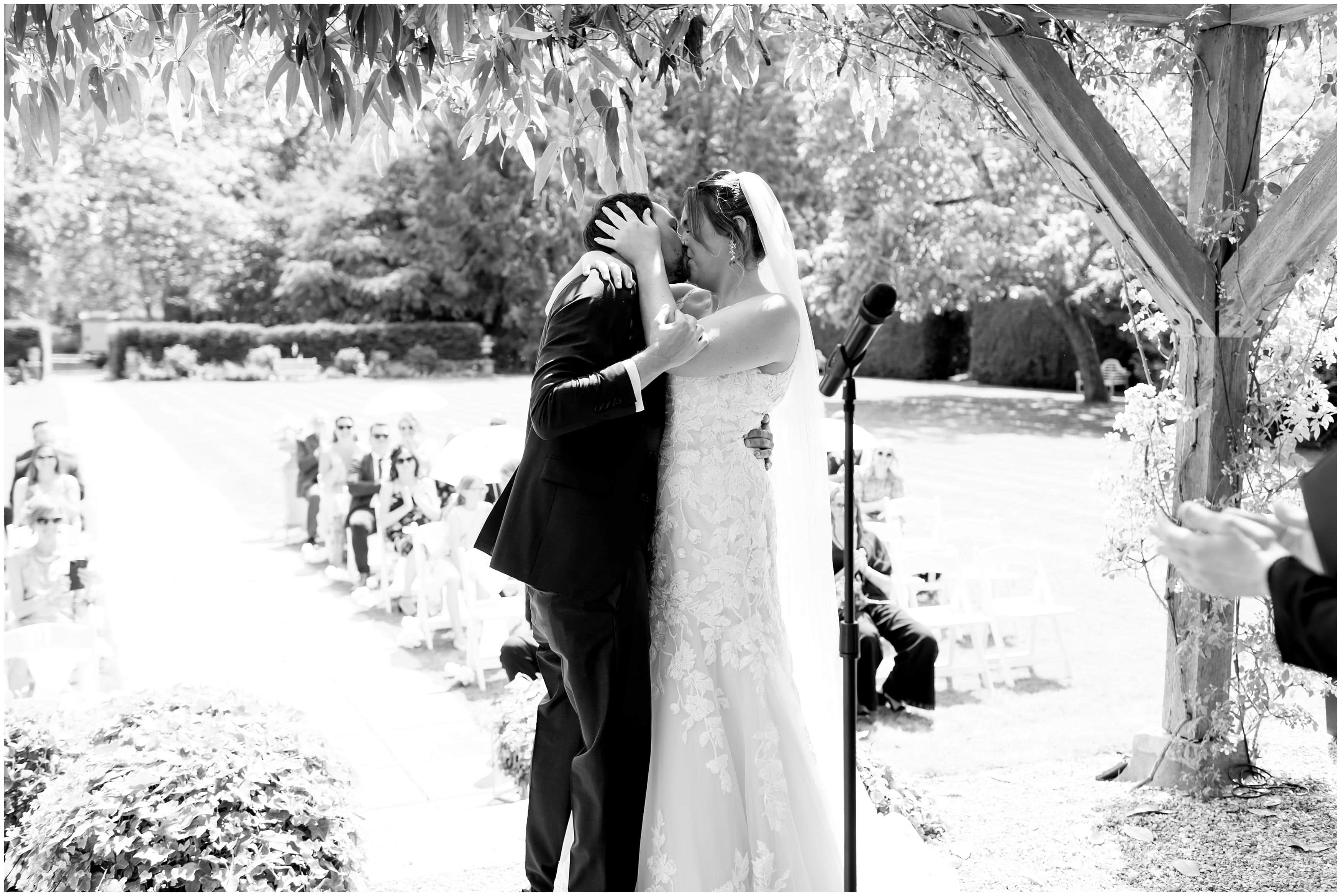 bride and groom first kiss at deans court