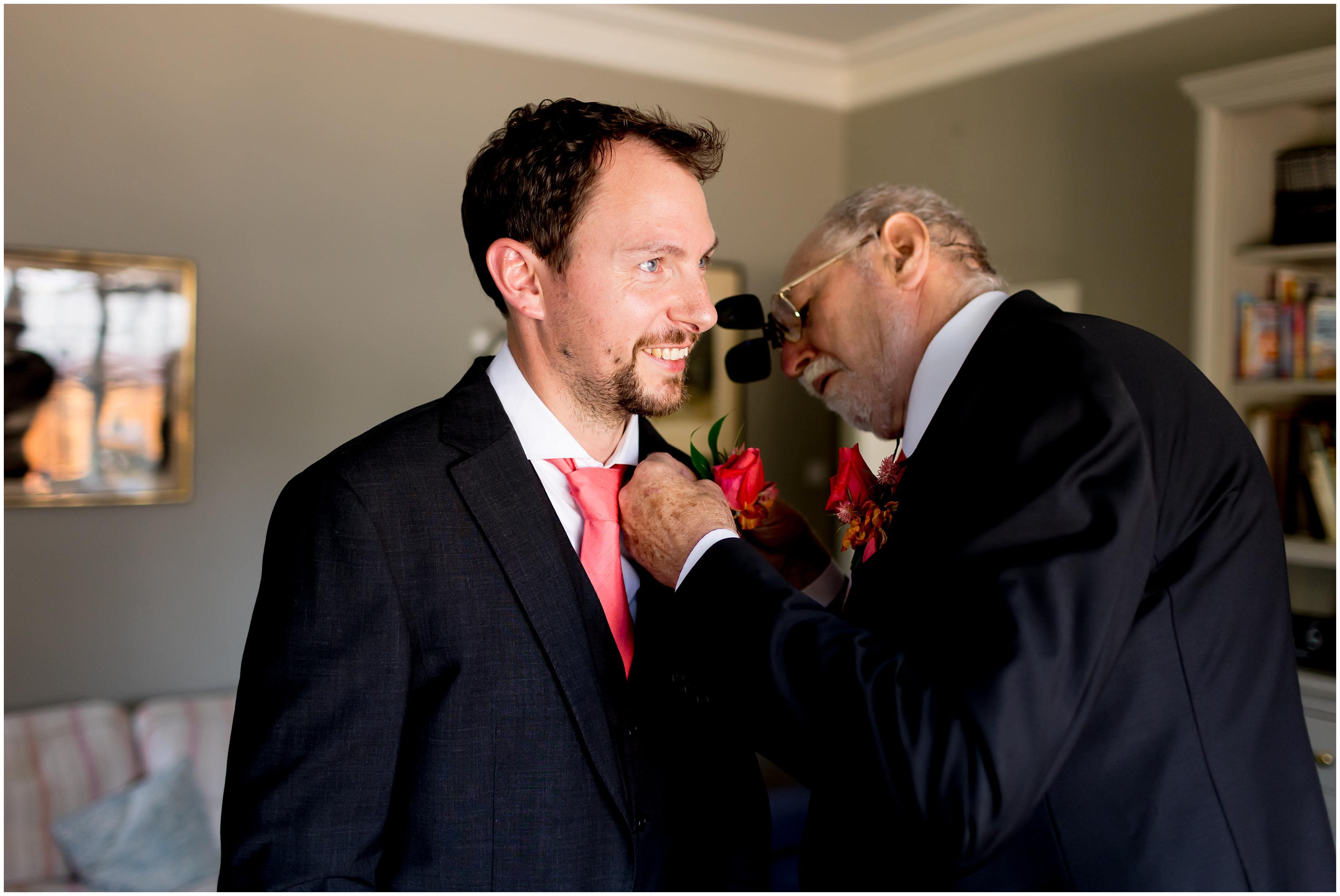 dad putting on buttonhole