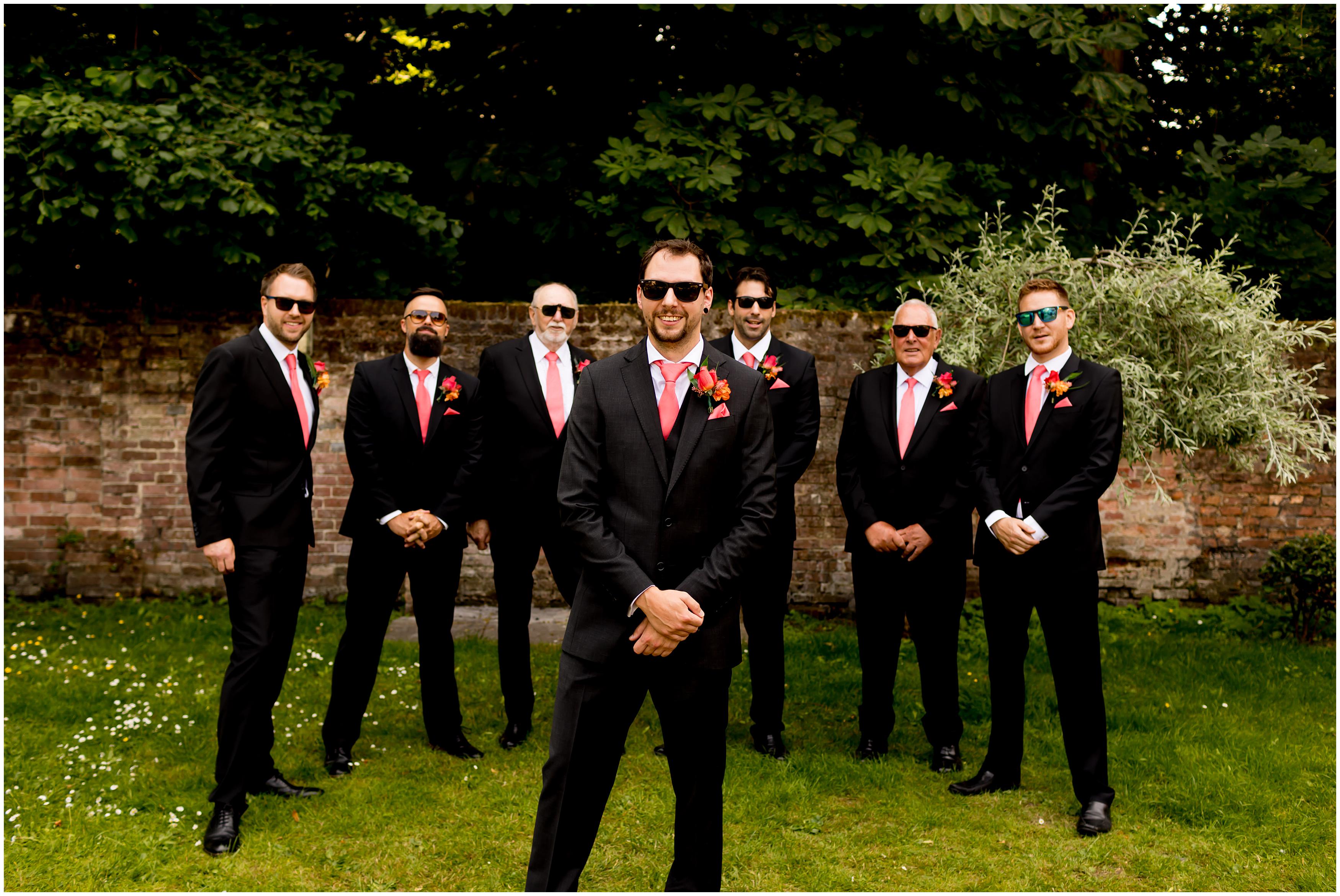 groom and groomsmen in sunglasses