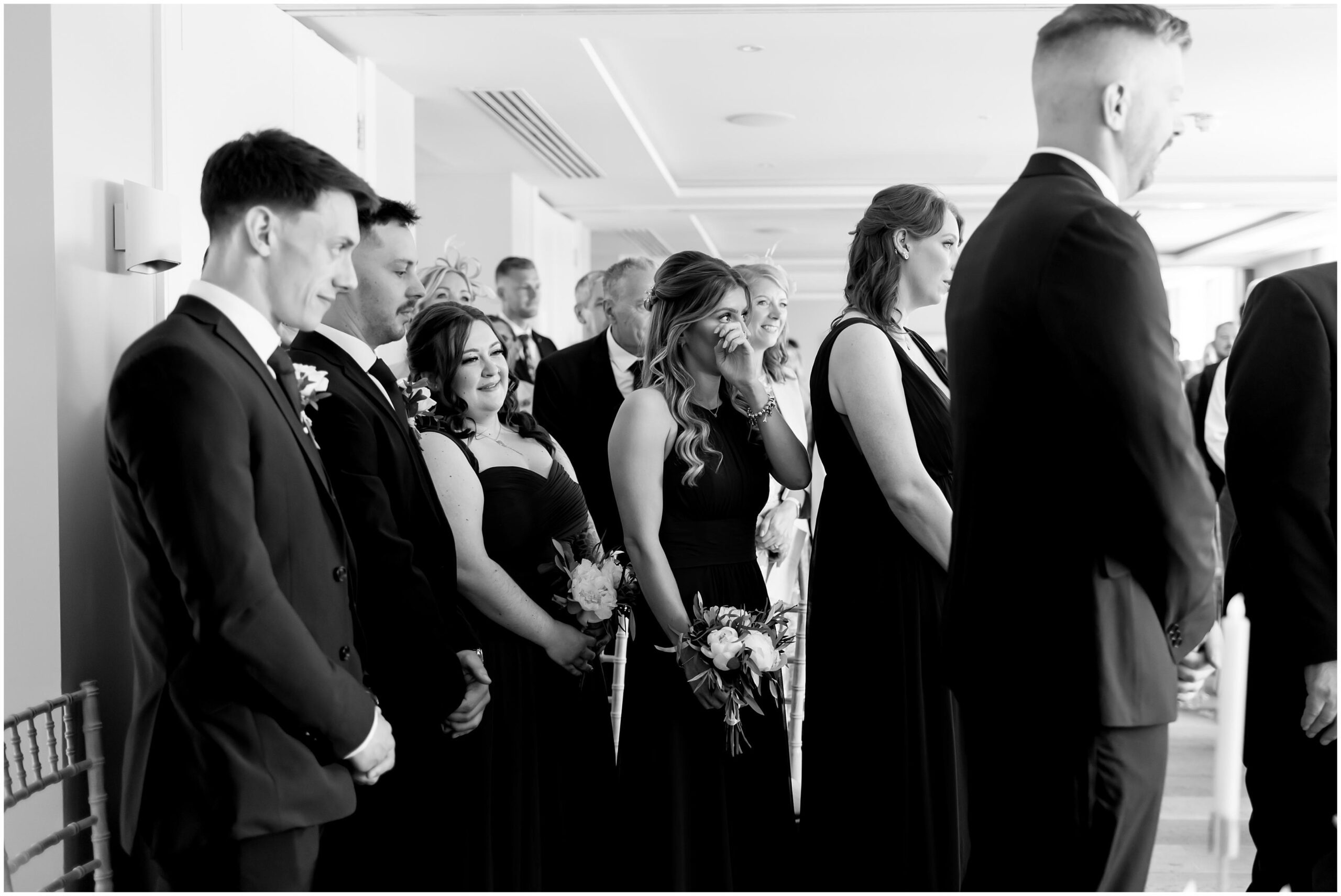 bridesmaid crying to brides entrance
